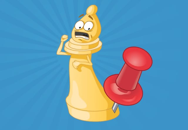 A cartoon bishop looking alarmed beside an oversized drawing pin.